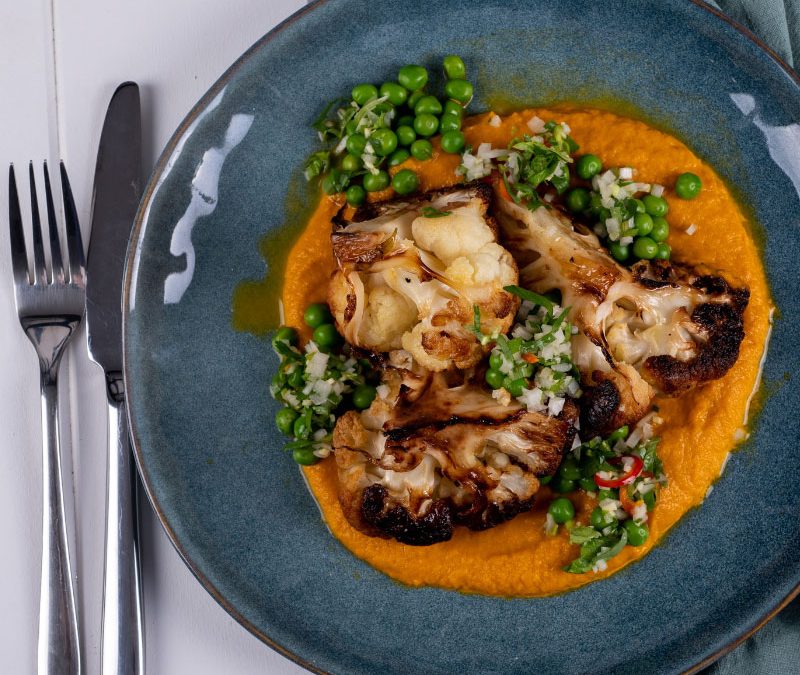 Roasted cauliflower with 5 spice carrot puree and sweet peas